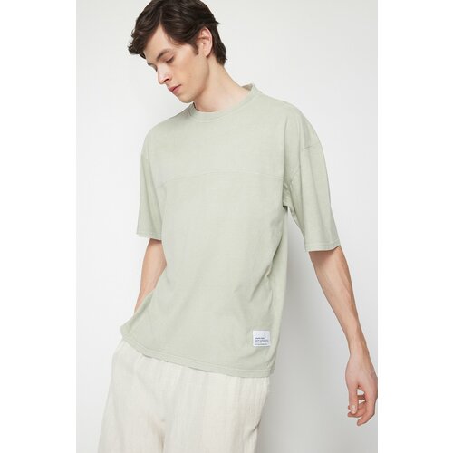 Trendyol Mint Men's Oversize/Wide-Fit 100% Cotton T-Shirt with Stitched Label Weathered/Faded Effect Slit Slike