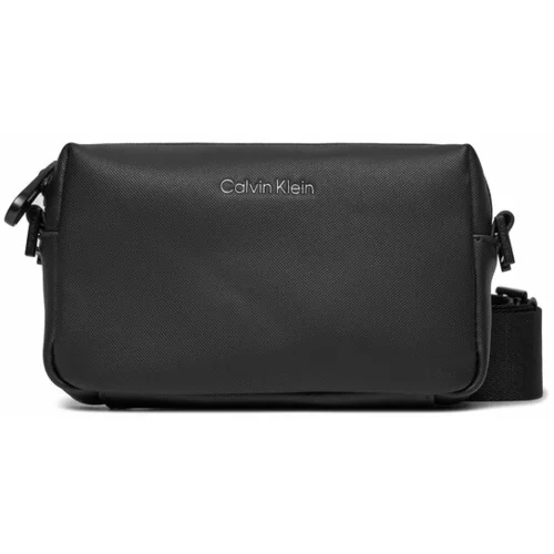 Calvin Klein Torbica za okrog pasu Ck Must Camera Bag S K50K511214 Črna