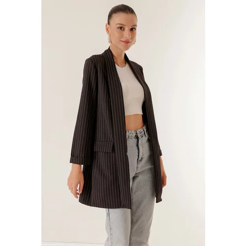 By Saygı Lycra longitudinal stripe long jacket with a shawl collar and fake pockets.