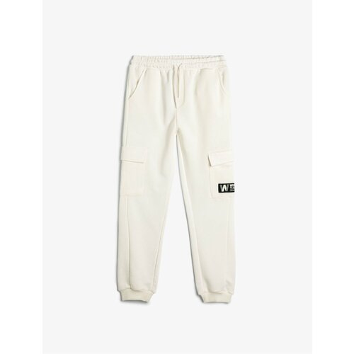 Koton Basic Jogger Sweatpants with Pocket Detail and Tie Waist Cene