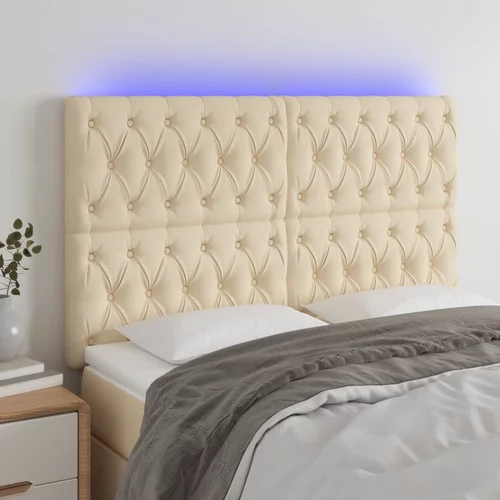 vidaXL LED posteljno vzglavje krem 144x7x118/128 cm blago