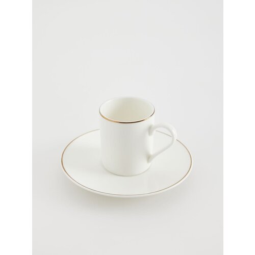 Reserved porcelanasta skodelica s krožnikom - bela Cene