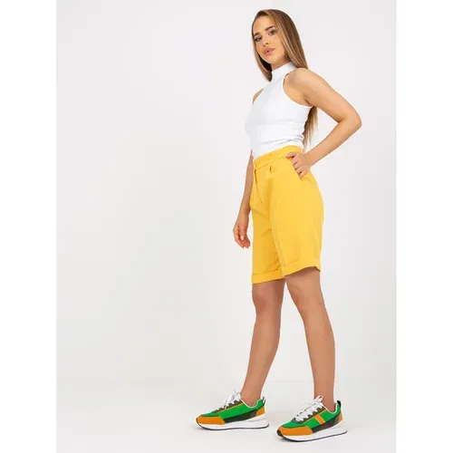 Fashion Hunters Elegant dark yellow long shorts with a high waist