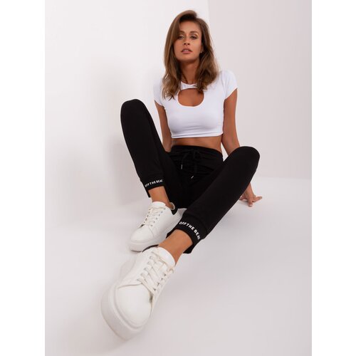 Fashion Hunters Black women&amp;#039;s sweatpants with pockets Slike