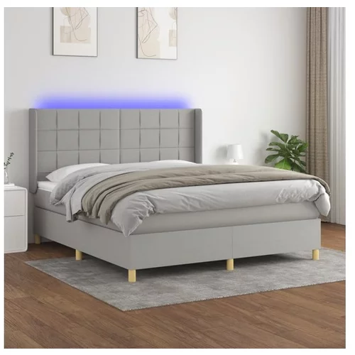  Box spring postelja z vzmetnico LED sv. siva 180x200 cm blago