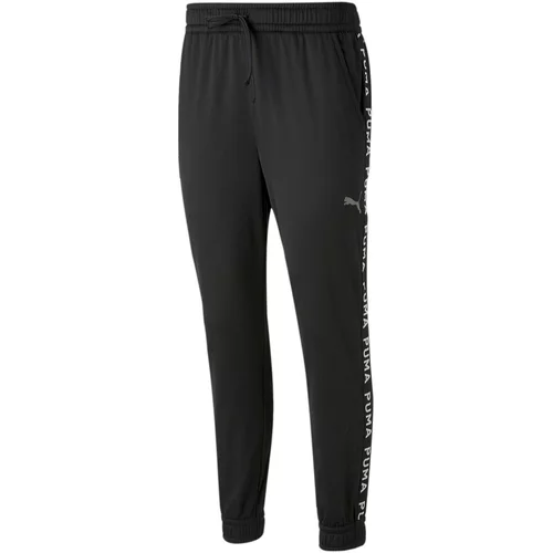 Puma Sportske hlače siva / crna