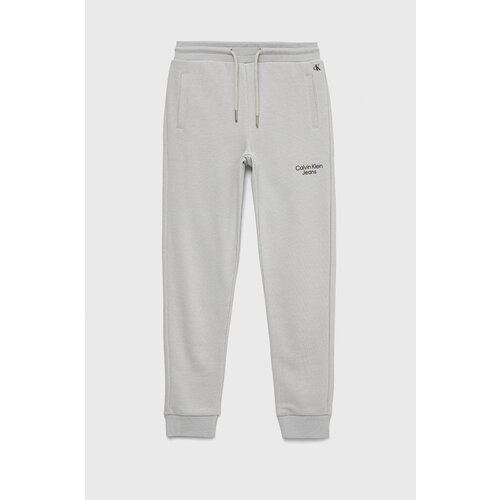 Calvin Klein Jeans Otro&amp;scaron;ke trenirka hlače siva barva Slike