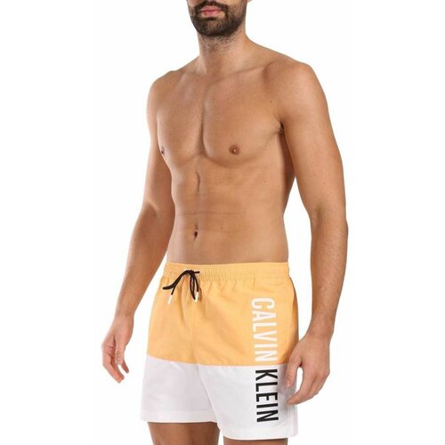 Calvin Klein Narandžasto-beli muški kupaći Cene