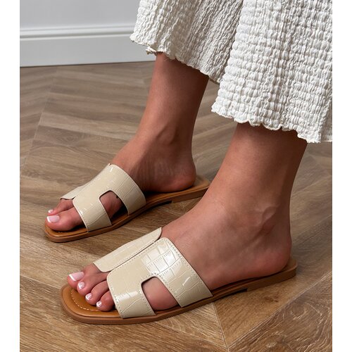 D/CEO Beige flat sole embossed sandals Sarini Cene