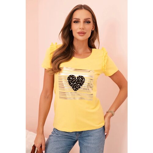 Kesi Women's cotton blouse with ruffle and heart made of rhinestones yellow Cene