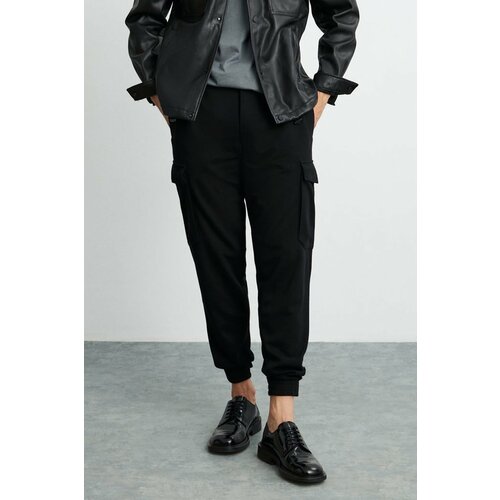 GRIMELANGE Leroy Men's Thick Textured Fabric, Velcro, 6 Pocket, Wide Cut Black Trousers with Elastic Waist Cene