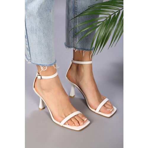 Shoeberry Women's Sesa White Skin Single Strap Heeled Shoes Slike