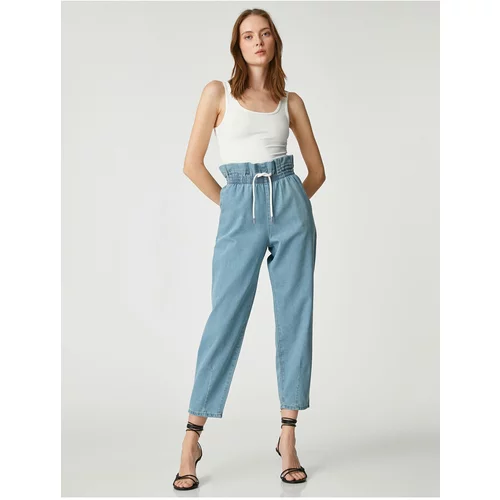 Koton Jeans with an elastic waistband have a relaxed fit - Baggy Jeans.