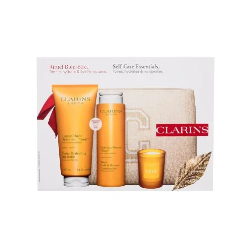 Clarins Aroma Self-Care Essentials set: balzam za telo Tonic Hydrating Oil-Balm 200 ml + gel za prhanje Tonic Bath & Shower Concentrate 200 ml + dišeča svečka 35 g + kozmetična torbica za ženske