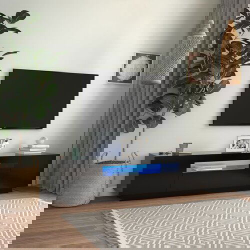 VidaXL TV omarica z LED lučkami črna 160x35x40 cm Slike