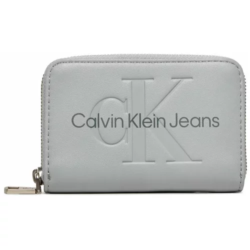 Calvin Klein Jeans Majhna ženska denarnica Sculpted Med Zip Around Mono K60K612255 Siva
