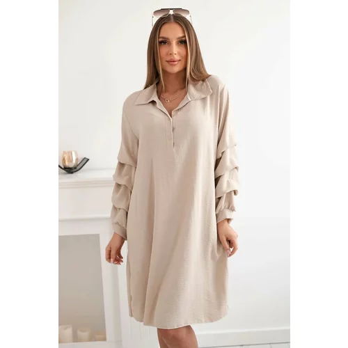 Kesi Oversized dress with decorative sleeves of beige color