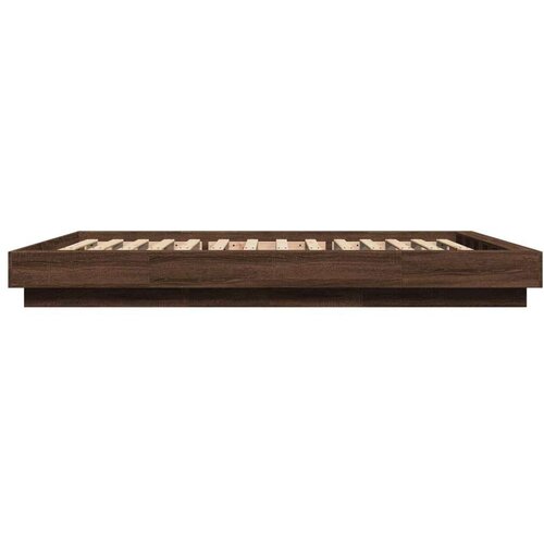 VidaXL Posteljni okvir z LED lučkami rjavi hrast 135x190 cm inž. les, (21142463) Slike