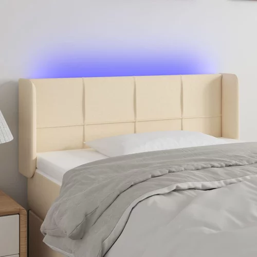 vidaXL LED posteljno vzglavje krem 83x16x78/88 cm blago