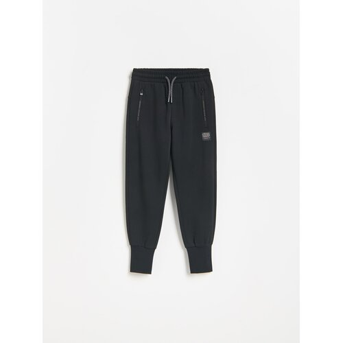 Reserved Pamučne jogger hlače - crno Cijene