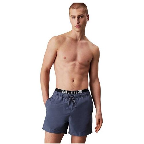 Calvin Klein plavo-sivi muški kupaći CKKM0KM01093-PCP Cene