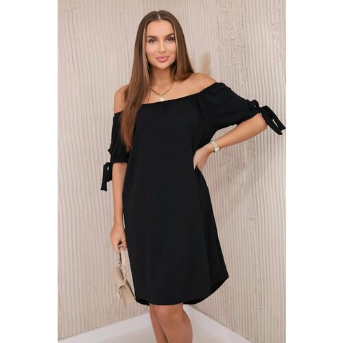 Kesi Dress with a longer back and ties on the sleeves black Cene