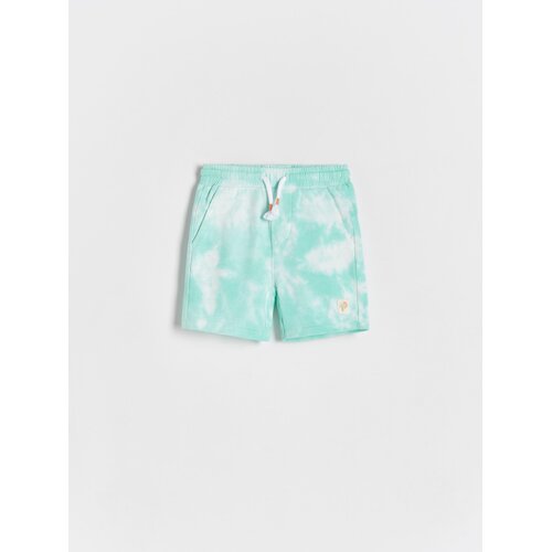 Reserved Kratke hlače s tie-dye vzorcem - Turkizna Cene