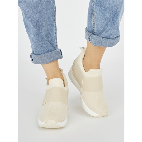 Shelvt Light beige women's sneakers on a wedge Cijene
