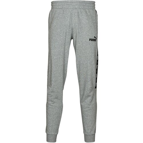 Puma Spodnji deli trenirke ESS+ TAPE SWEATPANT Siva Slike