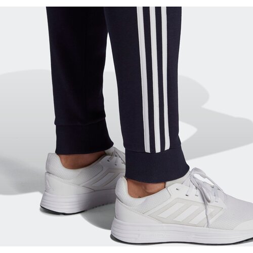 Adidas &amp;Scaron;portne hlače &amp;#039;Essentials Fleece Tapered Cuff 3-Stripes&amp;#039; modra / bela Slike