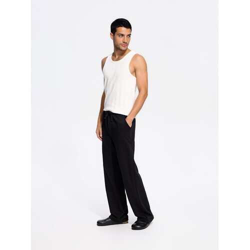Reserved MEN`S TROUSERS - crno Cijene
