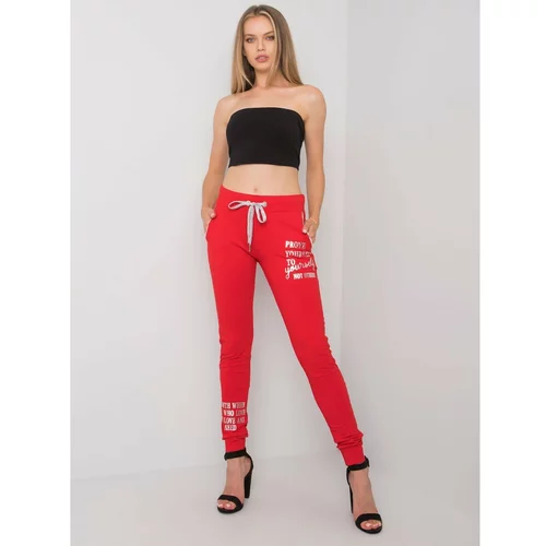 Fashion Hunters Women's red sweatpants with an inscription