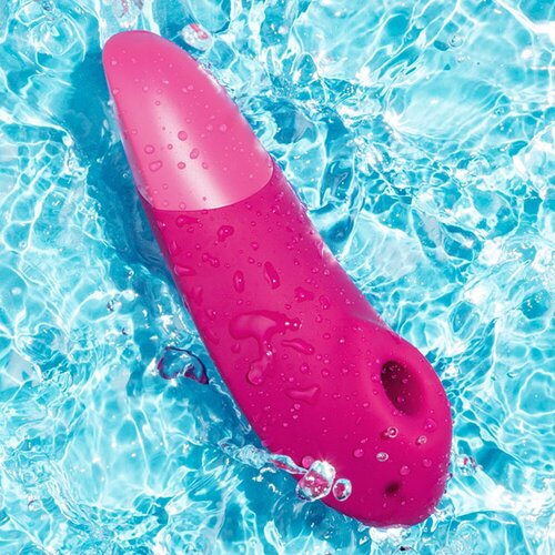 Womanizer Enhance - vibrator za klitoris s pulsirajućim zrakom (ružičasti) Slike