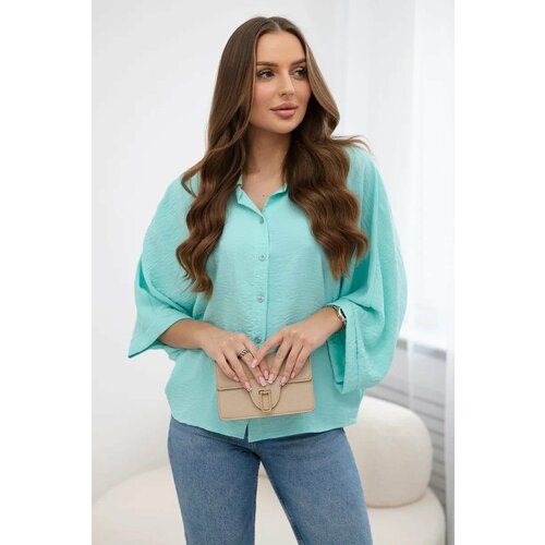 Kesi Mint-colored oversized blouse with button closure Slike