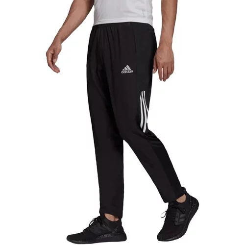 Adidas Sportske hlače 'Own The Run Astro Wind' crna / bijela