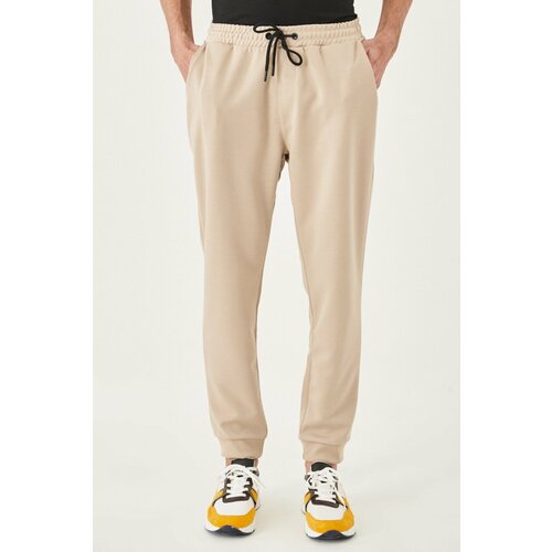 AC&Co / Altınyıldız Classics Men's Beige Standard Fit Regular Cut Comfortable Sports Sweatpants with Elastic Waist and Legs Slike
