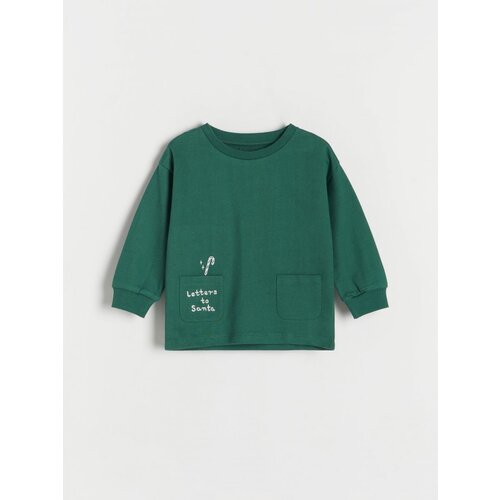 Reserved oversize top z dolgimi rokavi z božičnim motivom - zelena Cene