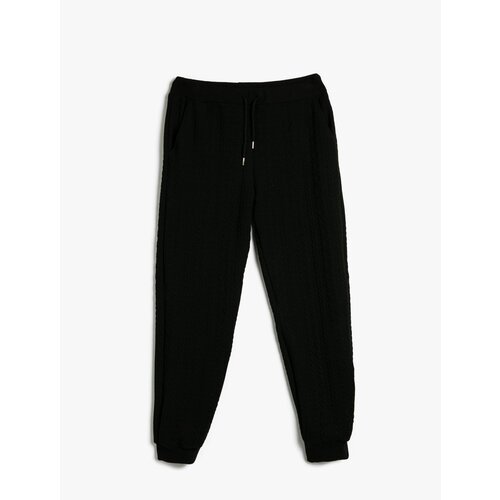 Koton Textured Jogger Sweatpants with a drawstring waist and pockets. Slike