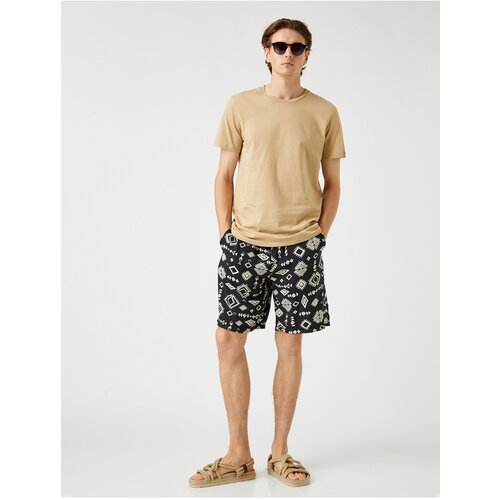 Koton Shorts - Black - Straight Slike
