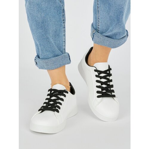 Shelvt White women's trainers Cene