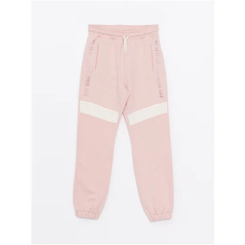 LC Waikiki Girl's Jogger Sweatpants with an Elastic Printed Waist.