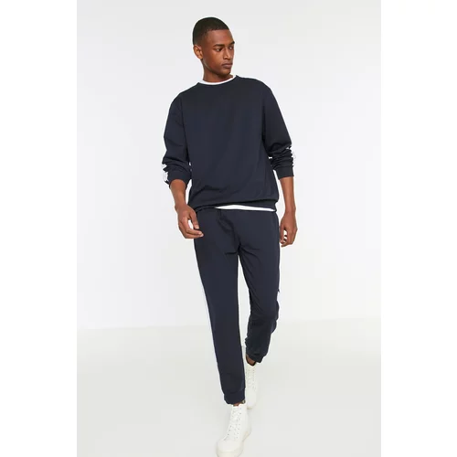 Trendyol Navy Blue Knitted Pajamas with Stripes.