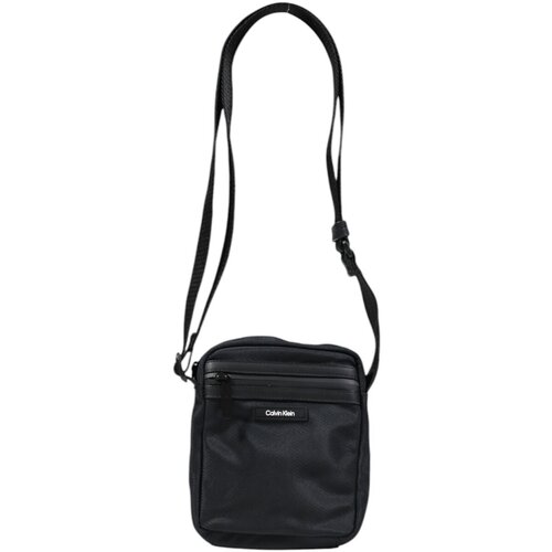 Calvin Klein Jeans Torbe za čez ramo CK ESSENTIAL REPORTER XS K50K512772 Črna Cene