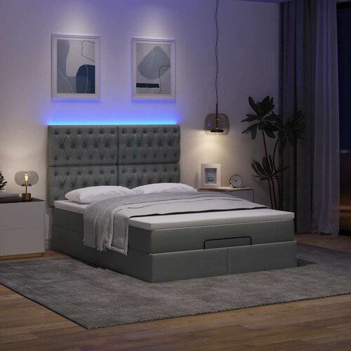 vidaXL Otomanski posteljni okvir z vzmetnico siv 140x200 cm blago Cene