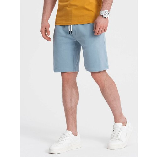 Ombre Men's knitted shorts with drawstring and pockets - light blue Cene