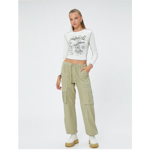 Koton Cargo Parachute Trousers with Pocket Detailed Tie Waist. Slike