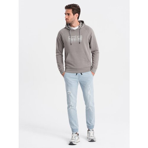 Ombre Men's JOGGER denim pants with rubbing - light blue Cene