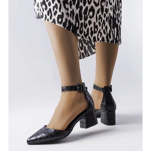 D/CEO Yellow pumps Lindsey Cene