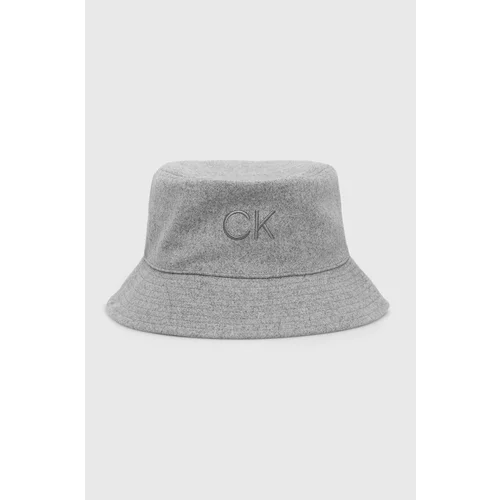 Calvin Klein Dvostranski klobuk siva barva