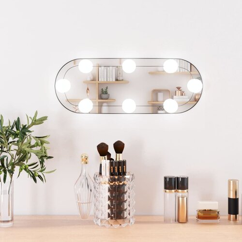 VidaXL Stensko ogledalo z LED lučmi 15x40 cm stekleno ovalno Slike